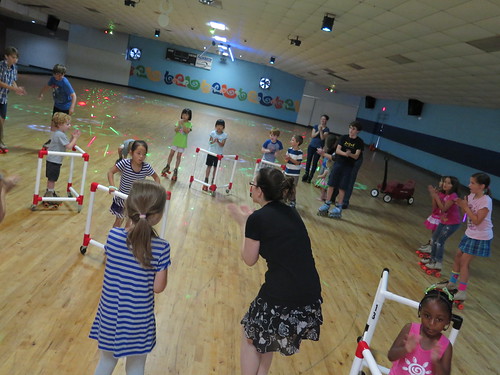 Doing the Hokey Pokey and trying to make Amelie laugh.