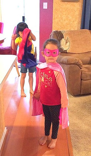 Grandma snapped this cute shot! Amelie has named herself "Pink Lightning" when she dresses like this.